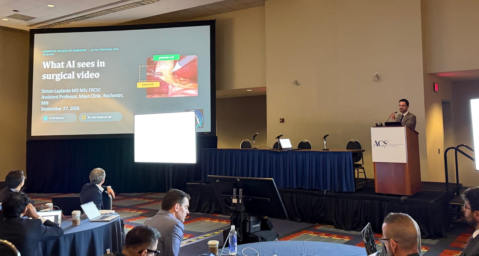 Dr. Simon J. Laplante presenting a slide titled What AI sees in surgical video at the ACS Clinical Congress.